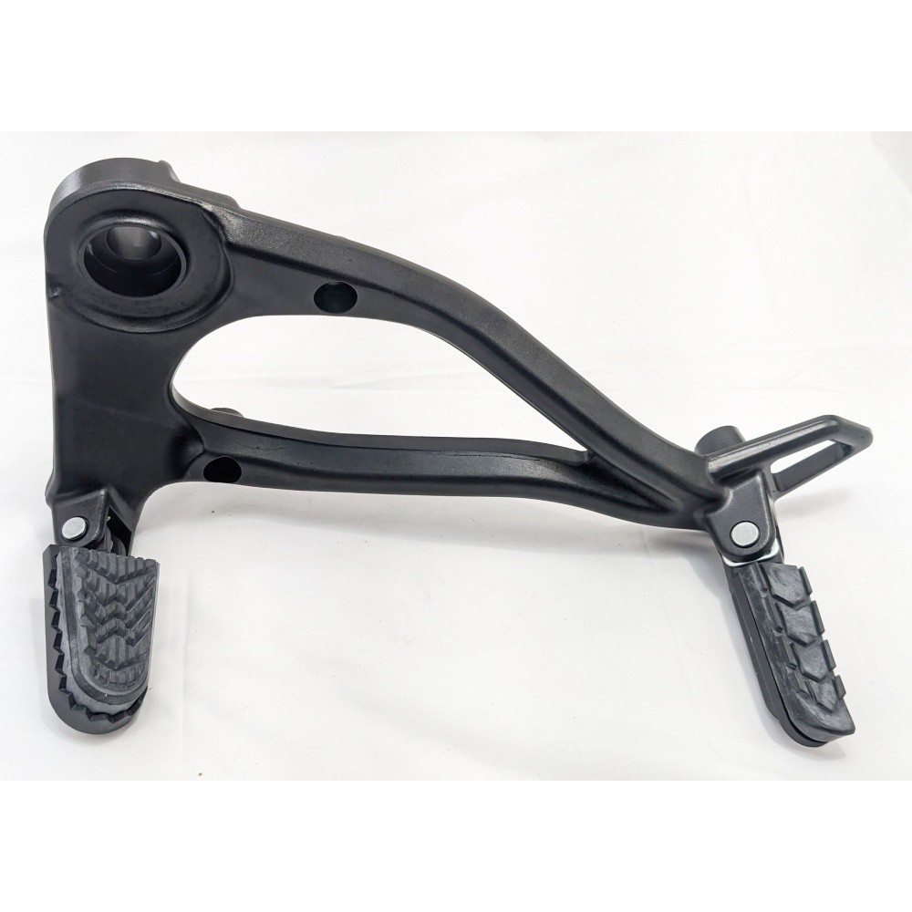 OEM complete LEFT side footpeg bracket assembly. Includes front and